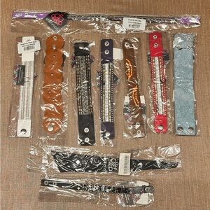 5 sets of wrap bracelets. 
Each set of 10 is $15
All are new. 
One set of mens